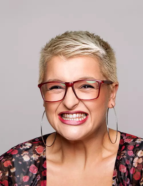 Stylish pixie hairstyle for older women with glasses