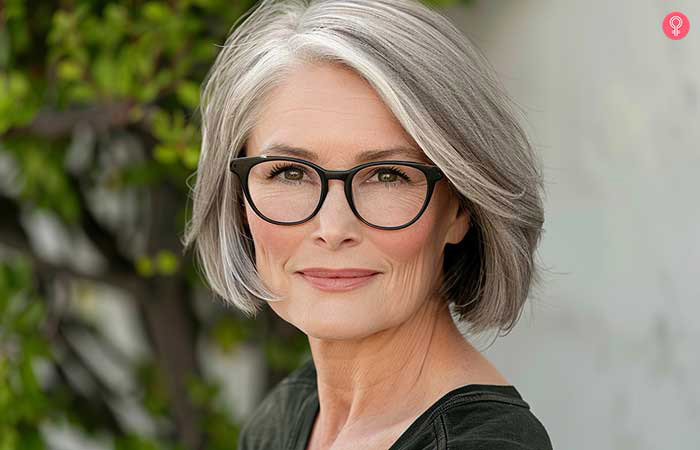 Thick bob hairstyle for older women with glasses