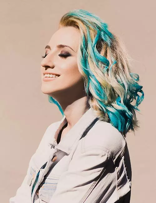 Two-tone hair color with blonde and bright blue