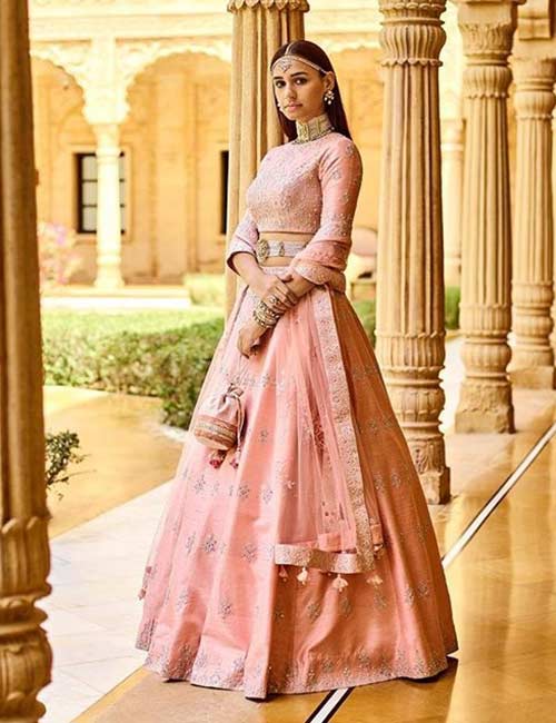 A blush silk lehenga for reception for Indian brides