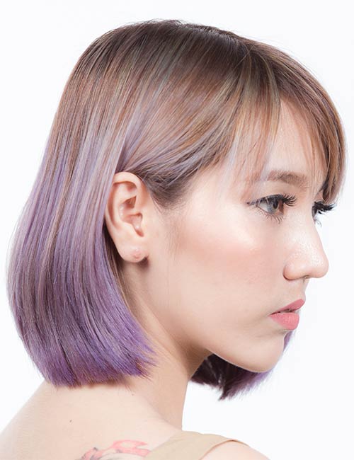 A beautiful brown and purple two-tone hair color