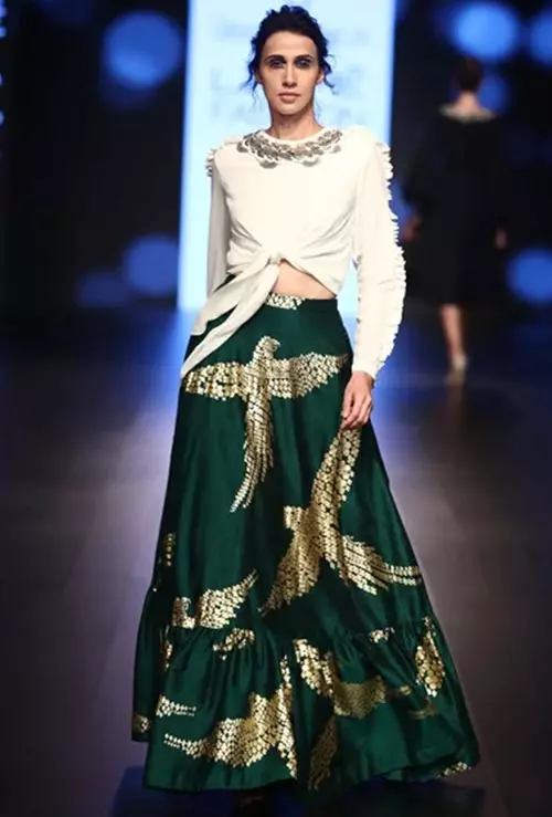 A contemporary raw silk lehenga for reception for Indian brides