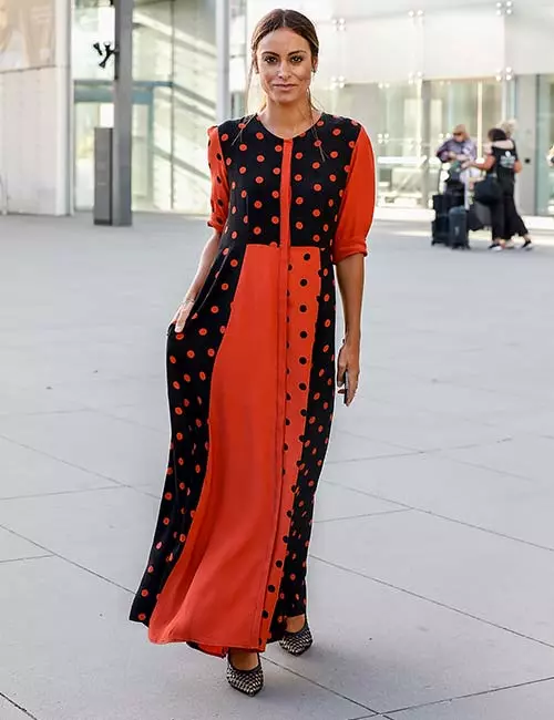 A flaming coral polka dot gown for an elegant look