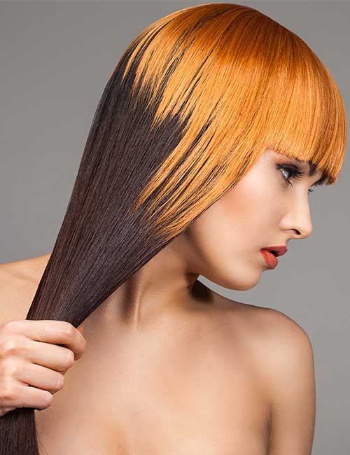 Two-tone hair color with orange and black