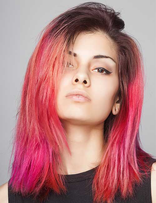 Two-tone hair color with light and dark hues of pink