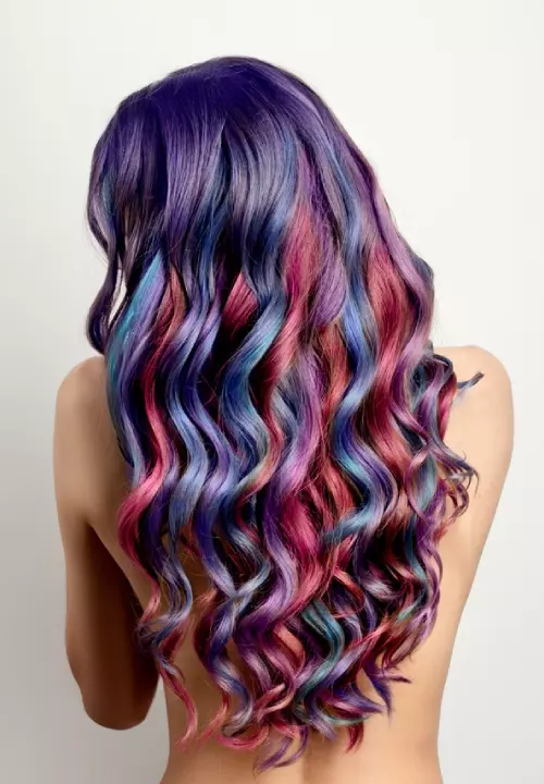 A woman with multicolor galaxy hair color
