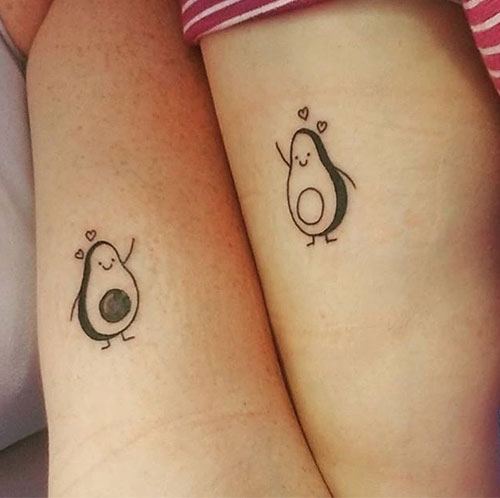 Matching avocado tattoos for mother and daughter