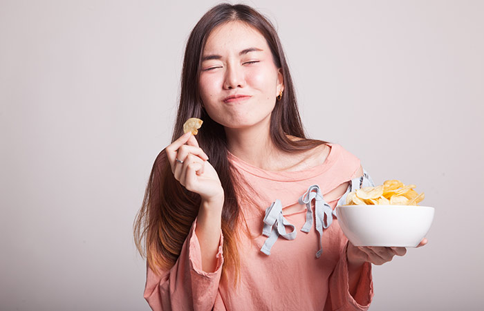 Eating Chips And Sweets