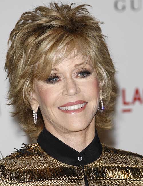 Jane Fonda in heavy golden layers hairstyle