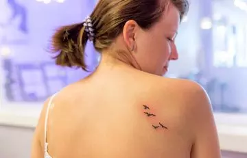 Take care of a new tattoo by waiting for it to heal
