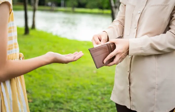 A student asking money from her parent