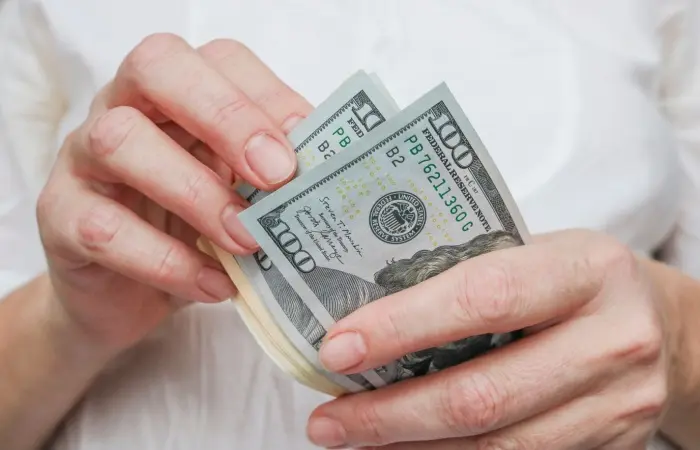 A woman counting money