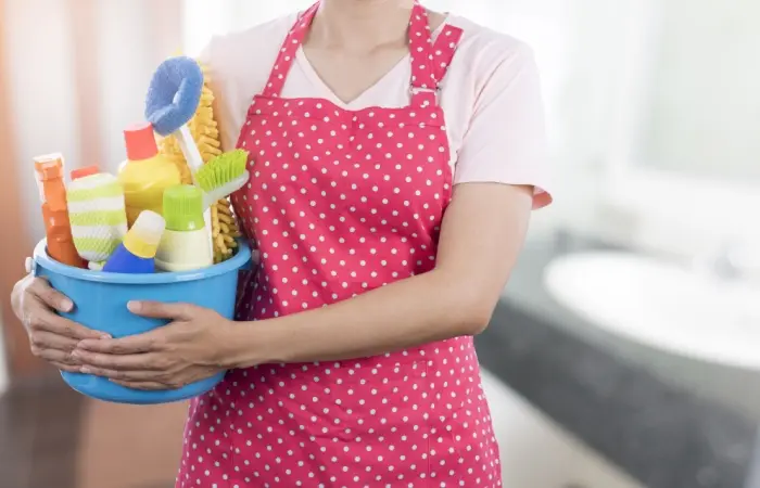 A house help with cleaning equipment