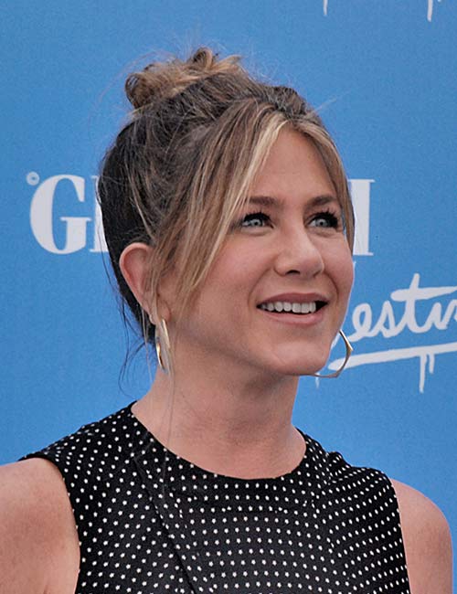 Jennifer Aniston simple classic top knot hairstyle