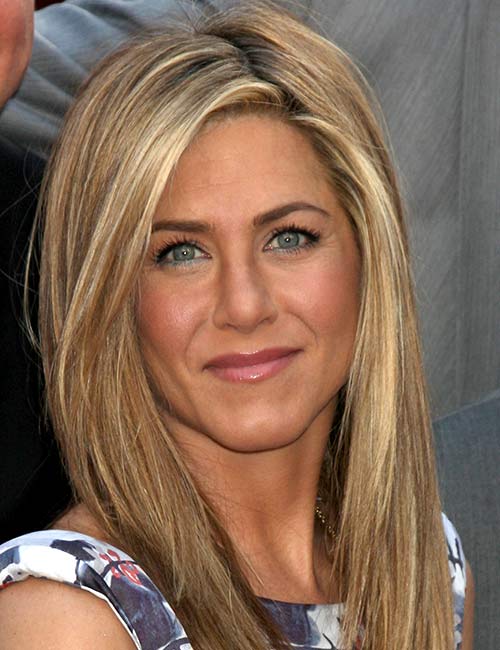 Jennifer Aniston slanted side parting with fuller layers hairstyle