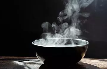 Now transfer the steaming hot water into a wide bowl