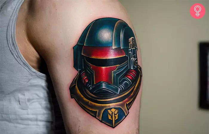 A man with a space marine tattoo on his upper arm.