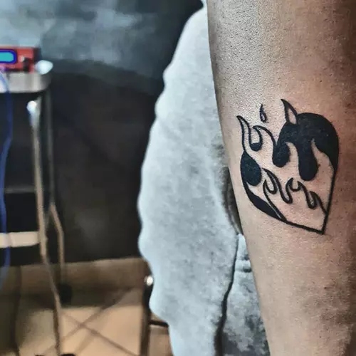 Burning heart tattoo design