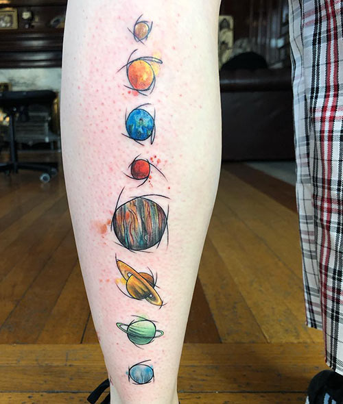Colorful planet space tattoo