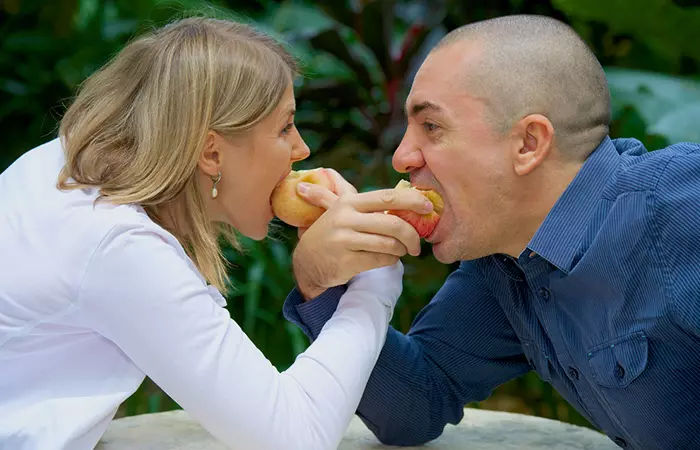 Couple having an eating contest