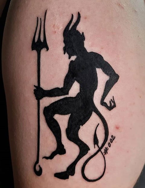 Demon silhouette tattoo design