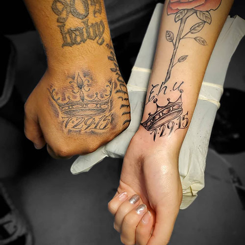Crowns for king and queen tattoos along with dates