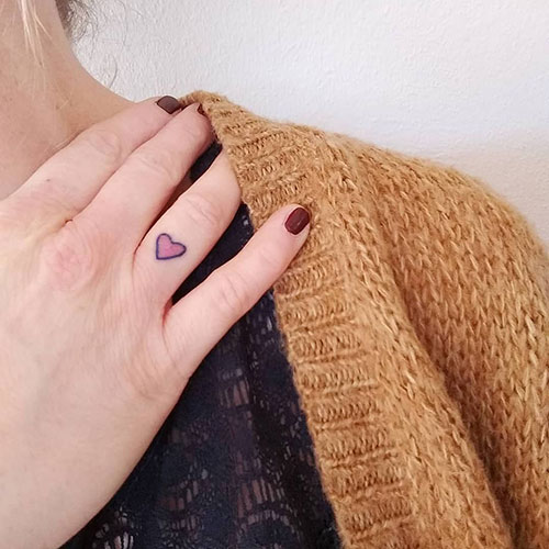Miniature finger tattoo design