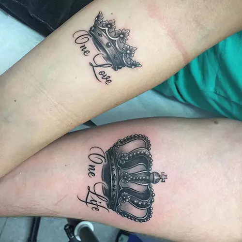 One life one love written along with crowns for king and queen tattoos