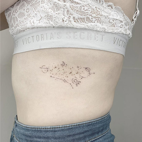 Side abdomen space tattoo