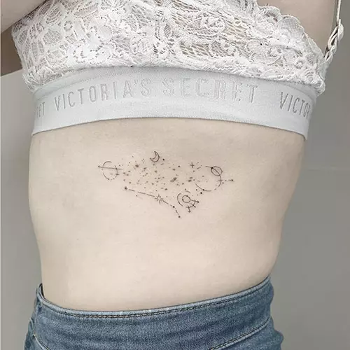 Side abdomen space tattoo