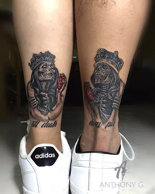 Skull king and queen tattos along with writing