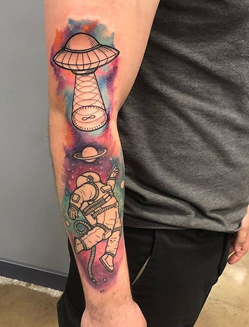 Space arm tattoo