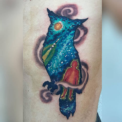 Space owl tattoo