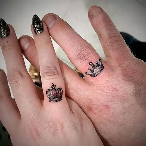 Tiny crowns for king and queen tattoos on the ring fingers