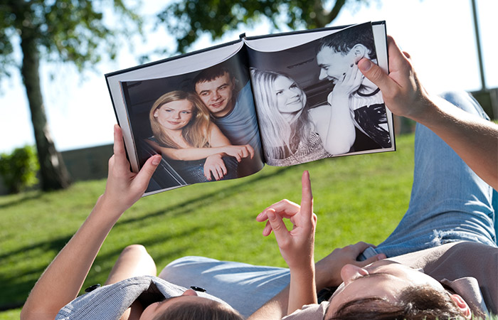 Couple looking at their photographs together