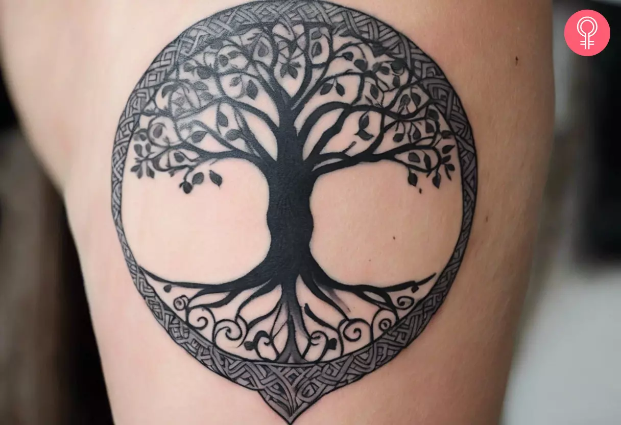 A woman with a Norse tree of life tattoo design
