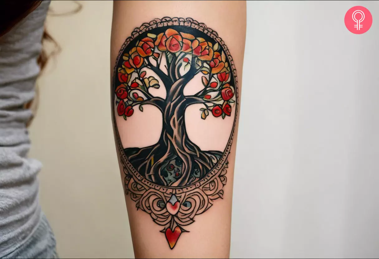 A woman with a tree of life and death tattoo on her arm