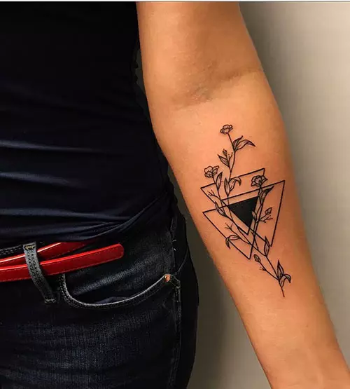 Floral triangle tattoo design