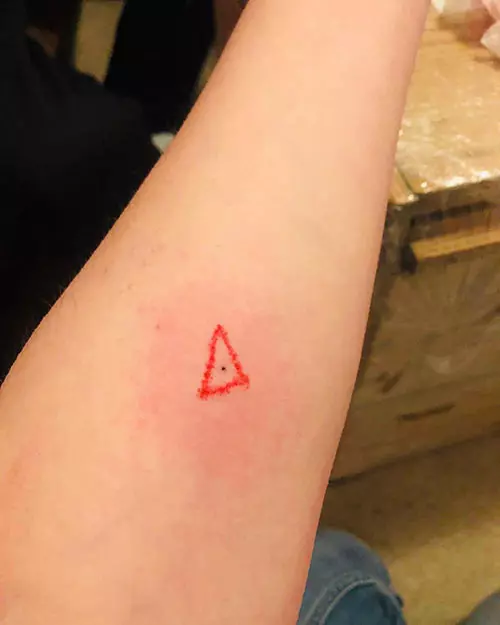 Red triangle tattoo design