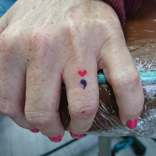 Semicolon tattoo design with heart