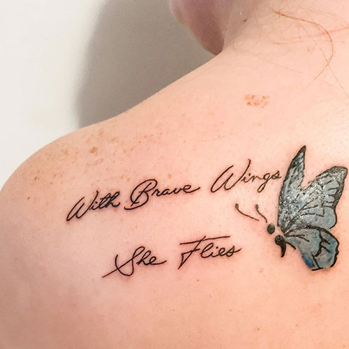 Stunning butterfly semicolon tattoo design