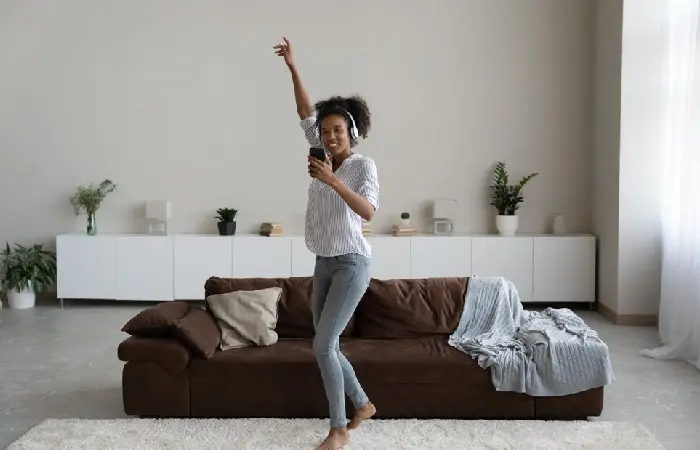 A woman dancing on video call