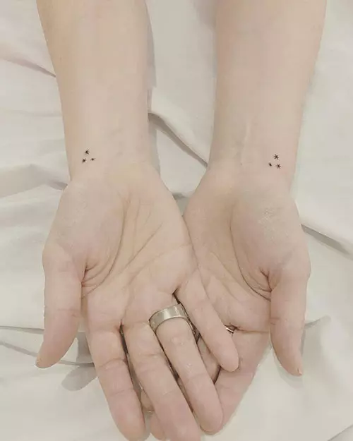 Three-dot triangle tattoo design