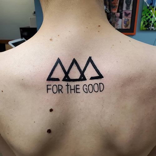Three triangles in a row tattoo design
