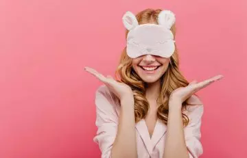 Woman with eye mask for doing blindfold makeover 