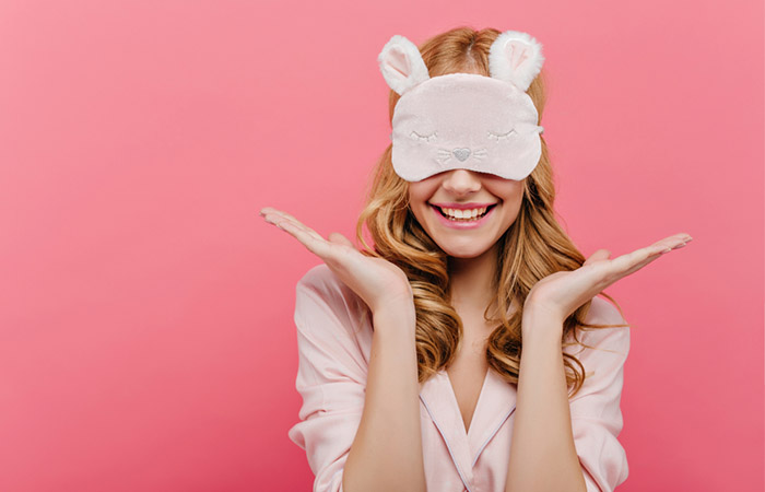 Woman with eye mask for doing blindfold makeover 