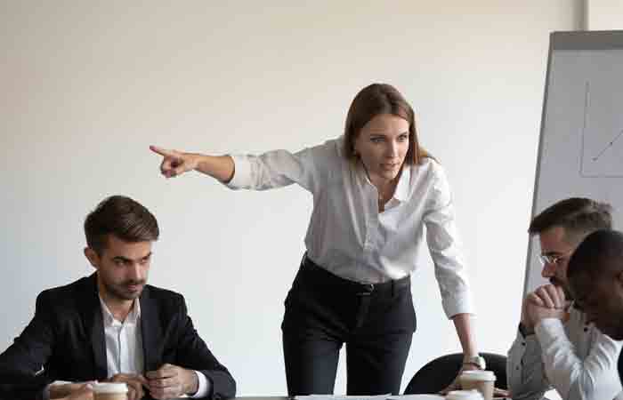 Controlling woman making sure everyone agrees to what she has to say