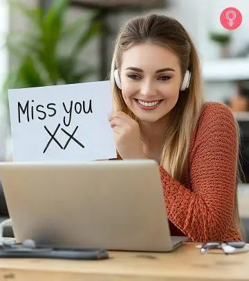 Girl showing miss you note in a video call