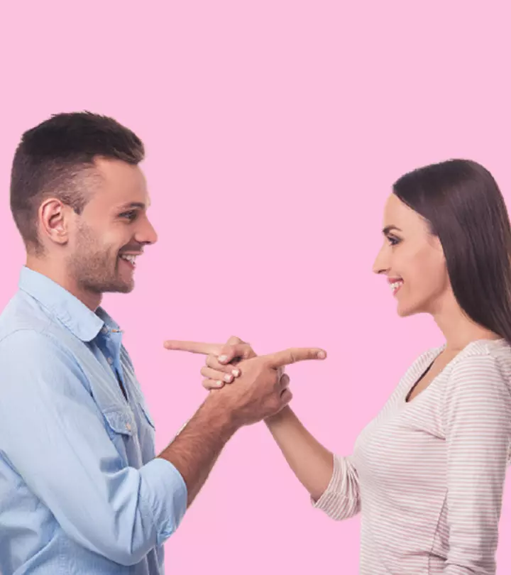 Couple showing the finger to each other
