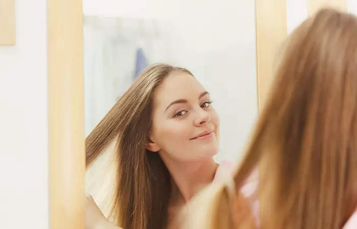 Woman taking care of her bleached hair